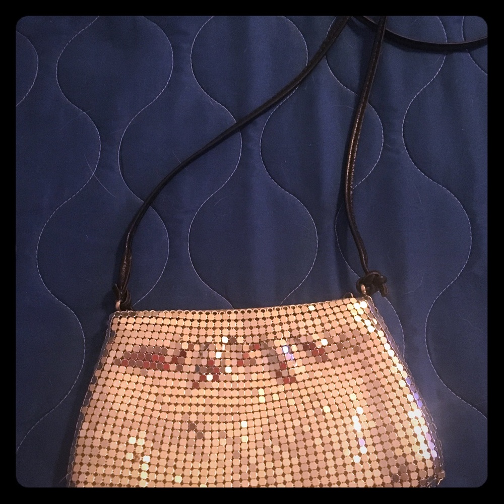 Silver clutch with black strap